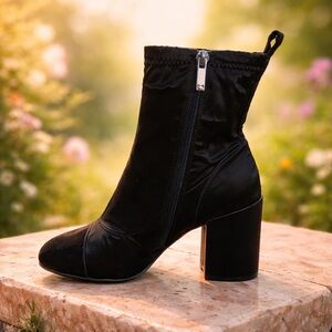 NWT Marc Fisher black booties stretch fabric Retail is $179